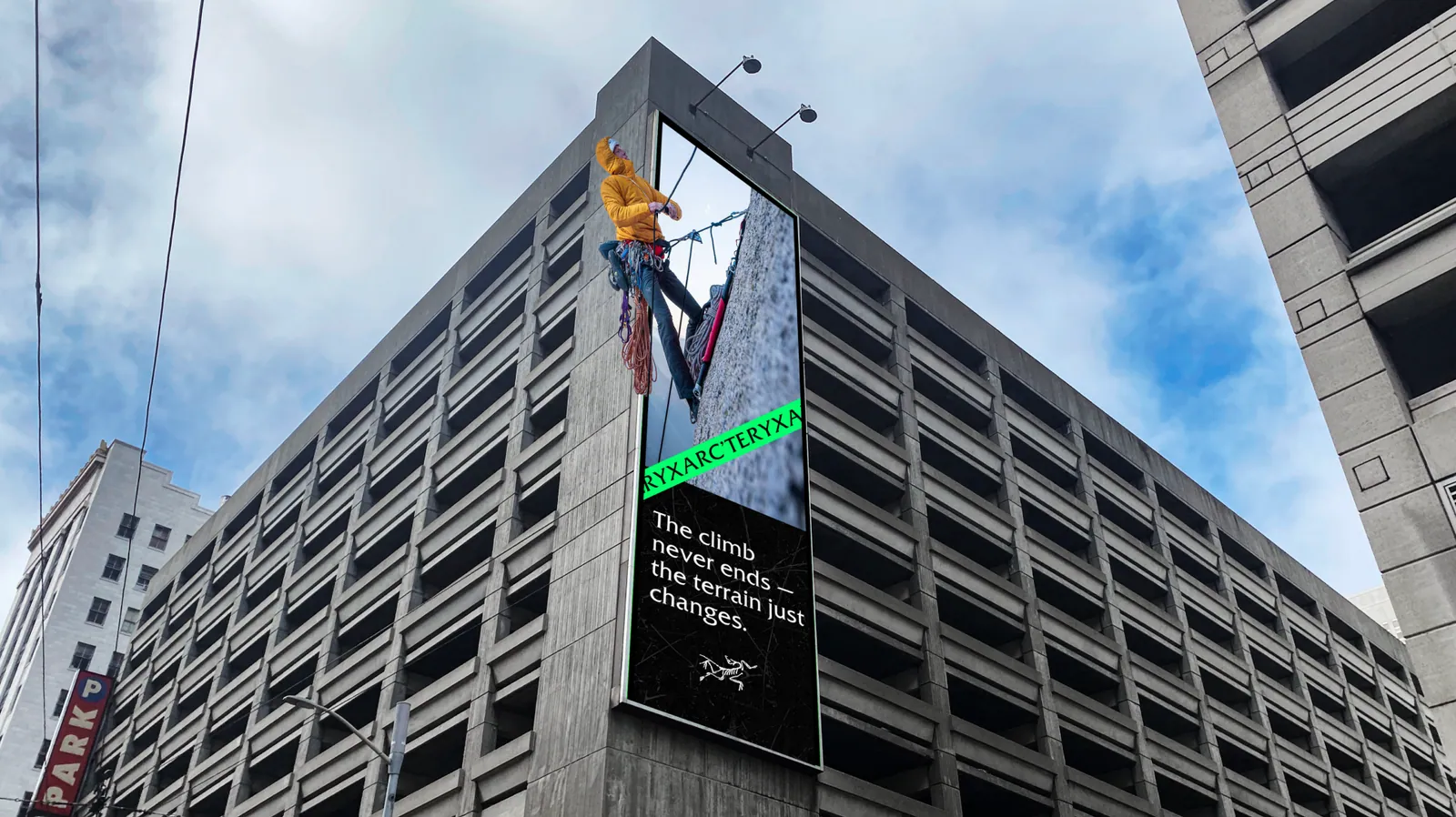Parking Garage Billboard — The Climb Never Ends